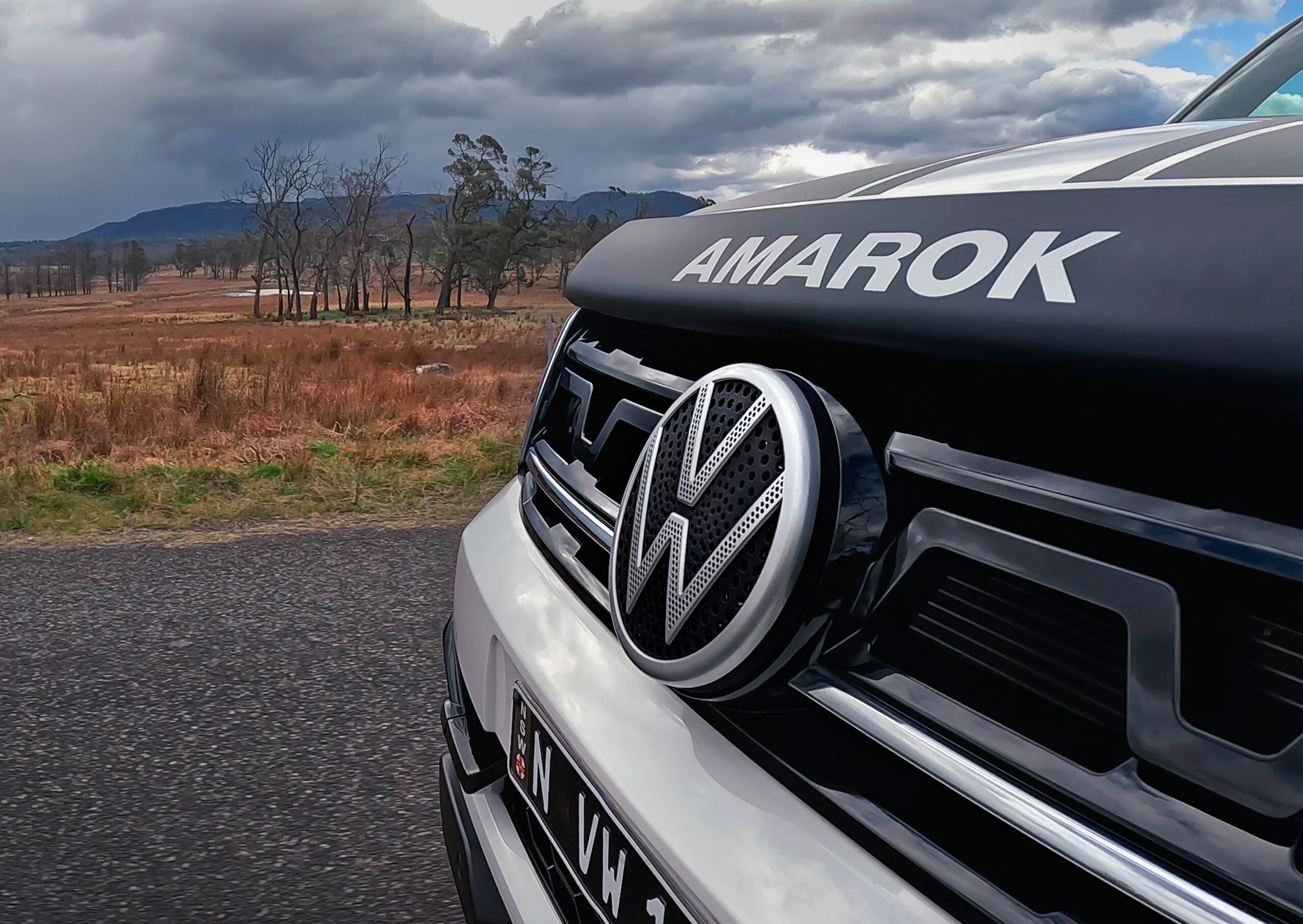 Roobadge campaign hero image showing front of VW vehicle with badge emblem